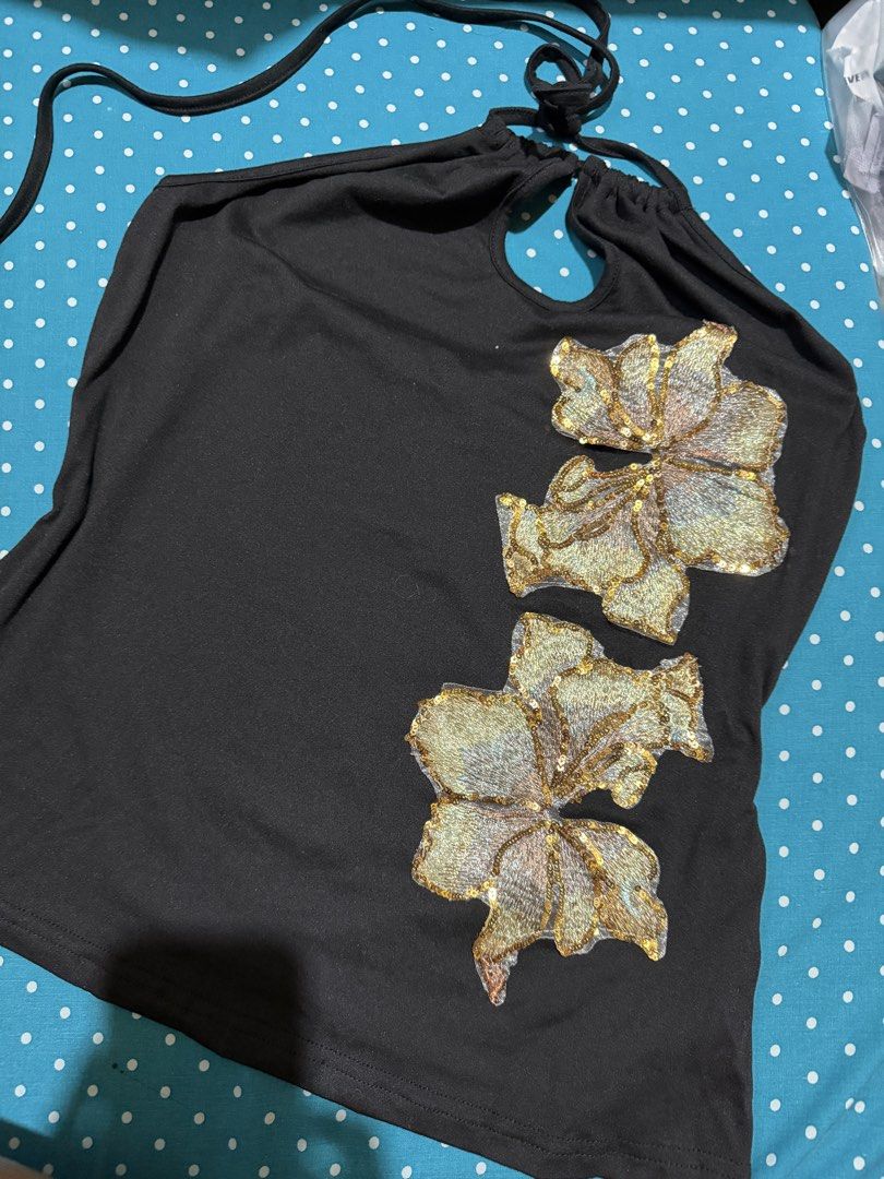 SHEIN Black Flower Sequin Halter Top (Category: Sleeveless) located in Manila. Submitted by ninib33 (Listing ID 1467264351, Image 1). Description: NEVER WORN THIS (TRIED IT ON LANG) can do ww for sure buyers only.