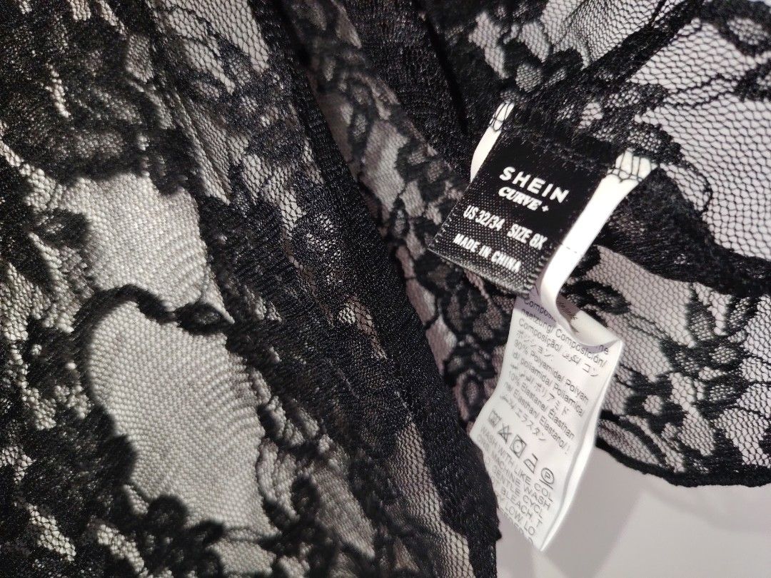 SHEIN Curve Black Lace Crop Top (Category: Sleeveless) located in Manila. Submitted by babeboxtheory (Listing ID 1467303947, Image 3). Description: - Brand: SHEIN Curve - Size: US 32/34 (8X) - Color: Black - Design: Square neckline with ruched center, wide straps, sleeveless - Detail: Sheer floral lace panel at the bottom hem - Style: Great for layering or a stylish night out.