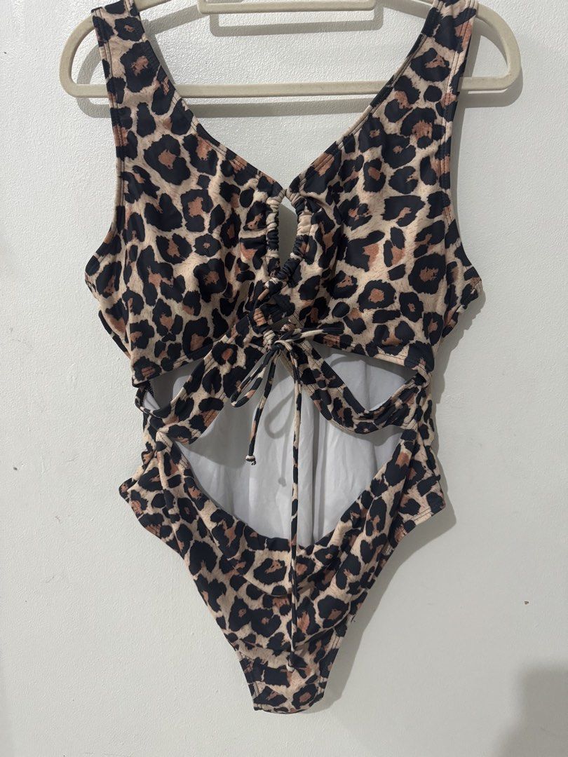 SHEIN Leopard Print Cutout One-Piece Swimsuit (Category: Bikinis & Swimsuits) located in Pasig City. Submitted by pmlmri (Listing ID 1467355586, Image 1). Description: SHEIN Leopard Print One Piece Swimwear Fits: XL to 3XL body frame Rfs: not in use and in need of funds Mode of Shipping: J&T or Lalamove or Grab express Mode of Payment: Gotyme/BPI/Gcash.