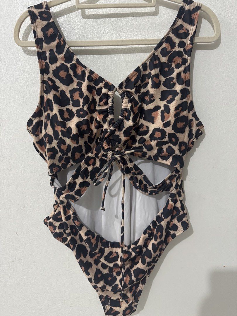 SHEIN Leopard Print Cutout One-Piece Swimsuit (Category: Bikinis & Swimsuits) located in Pasig City. Submitted by pmlmri (Listing ID 1467355586, Image 2). Description: SHEIN Leopard Print One Piece Swimwear Fits: XL to 3XL body frame Rfs: not in use and in need of funds Mode of Shipping: J&T or Lalamove or Grab express Mode of Payment: Gotyme/BPI/Gcash.