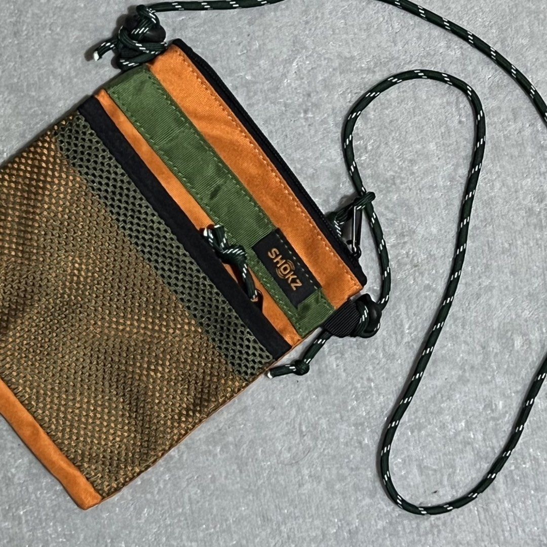Shokz sling bag (Category: Sling Bags) located in Bacoor. Submitted by xaviergilan29 (Listing ID 1467321138, Image 2). Description: SHOKZ string sling bag •Good as new •Has multiple compartments •No flaws •690PHP.