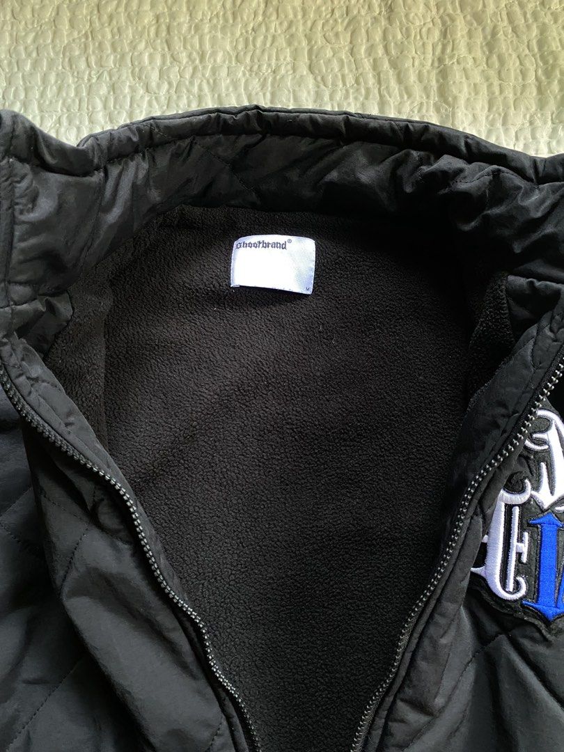 shootbrand black quilted zip up jacket (Category: Coats, Jackets and Outerwear) located in Iloilo. Submitted by chapxythriftshop (Listing ID 1467222279, Image 3). Description: - Brand/Model: Shootbrand quilted jacket - Color: Solid black - Size: Medium - Design: Diamond pattern stitching with embroidered chest patch (white and blue lettering) - Features: Mock neck, full zip front, soft fleece lining, elastic cuffs, and adjustable drawstring hem -