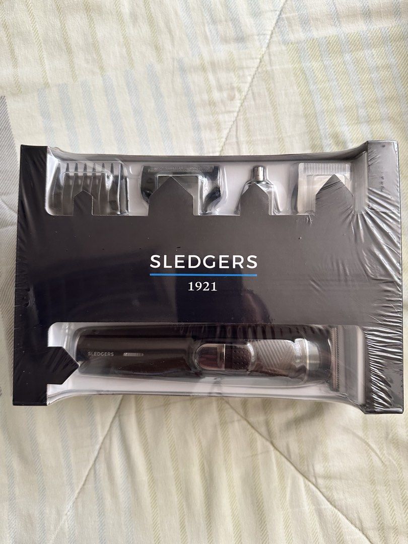 Sledgers 1921 Grooming Kit (Category: Men's Grooming) located in Cebu City. Submitted by noemondragon (Listing ID 1467183828, Image 3). Description: - Brand: Sledgers 1921 - Item: Grooming kit - Color: Black - Condition: Brand new, completely unopened in original plastic packaging - Features: Multiple attachments included for versatile trimming and styling.