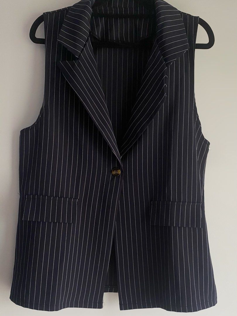 Navy Blue Sleeveless Stripes Polo Top (Category: Sleeveless) located in Quezon City. Submitted by shopmariascloset_ (Listing ID 1467184942, Image 1). Description: .