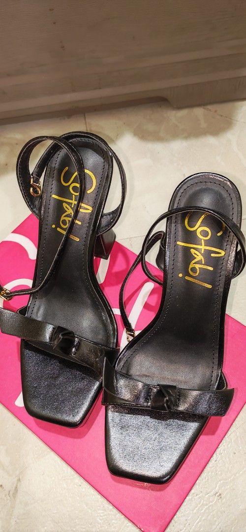 Sofab Black Platform Heels with Bow Detail (Category: Heels) located in Mandaluyong City. Submitted by trisha_001 (Listing ID 1467276201, Image 1). Description: - Brand: Sofab - Style: Black platform heels with thick flared heels, buckle ankle straps, and a cute front bow - Condition: Brand new, never worn, with protective packaging paper intact - Packaging: Comes in original pink box with SM Store tags.