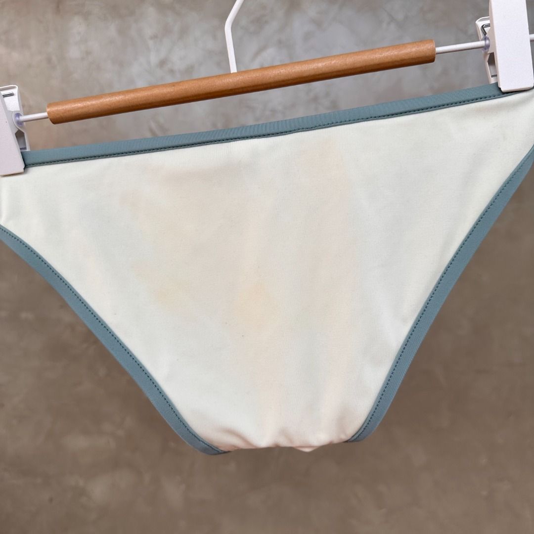 Solid & Striped Bikini Bottom Size XS (Category: Bikinis & Swimsuits) located in Balanga. Submitted by manitidiana (Listing ID 1467312323, Image 3). Description: - Brand: Solid & Striped - Color: Off-white with muted green trim - Size: XS (tag attached) - Style: Classic low-rise cut - Condition: Clean fabric with minimal wear / brand new with tag - Perfect staple for beach trips and pool days.