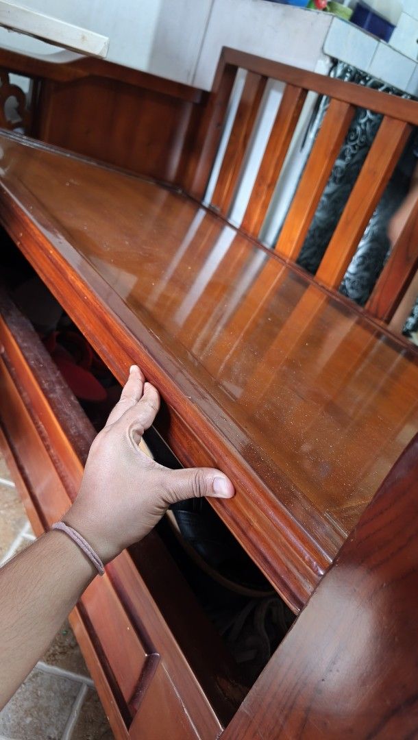 Solid Wooden Bench With Hidden Storage Compartment (Category: Chairs) located in Marikina City. Submitted by heylynzzyy008 (Listing ID 1467169476, Image 3). Description: For PICK-UP ONLY ‼️ Selling our large wooden storage bench with a beautiful reddish-brown finish and elegant decorative carved side panels. Price: 8,000 NEGOTIABLE RFS: Moving out ✅ Size 5-5.5 Feet long approx. ✅ Spacious built-in storage compartment ✅ Heavy and sturdy wooden con
