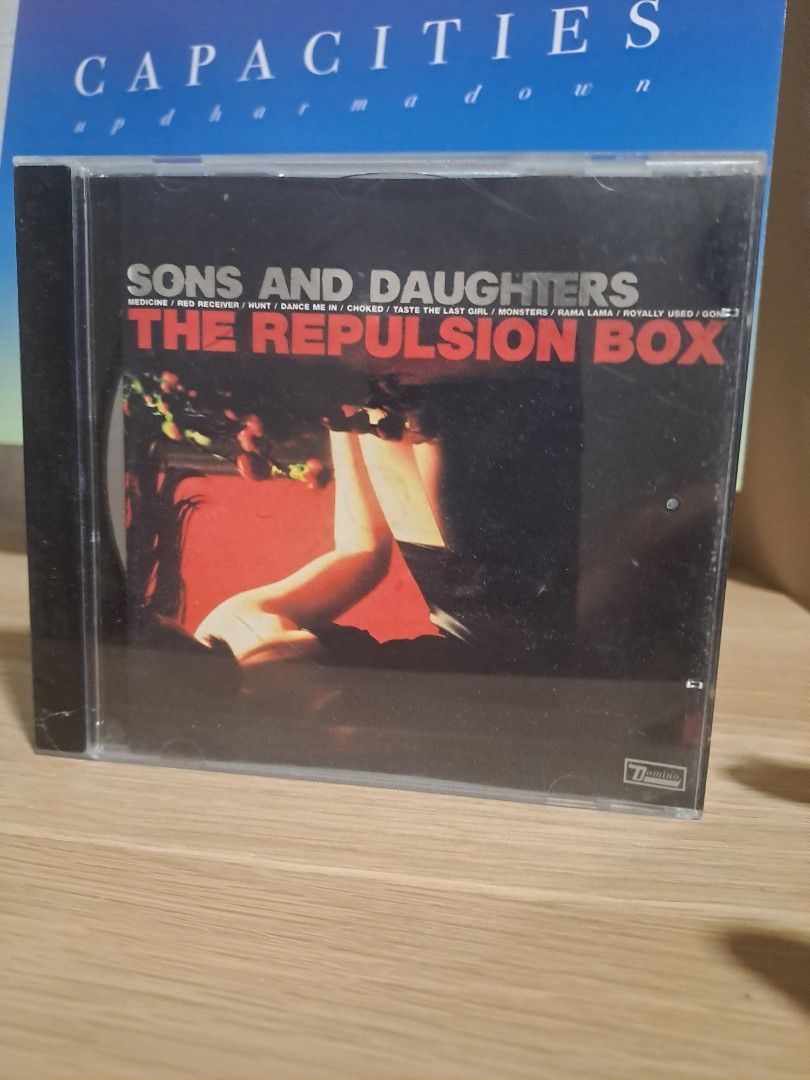 Sons and Daughters - The Repulsion Box CD (Category: CDs & DVDs) located in Las Pinas. Submitted by cobieshop (Listing ID 1467328742, Image 1). Description: - Artist & Album: Sons and Daughters - The Repulsion Box - Label: Domino Records - Format: Jewel Case CD - Genre: Classic mid-2000s indie rock - Tracklist includes: Medicine, Red Receiver, Hunt, and more (printed on cover).