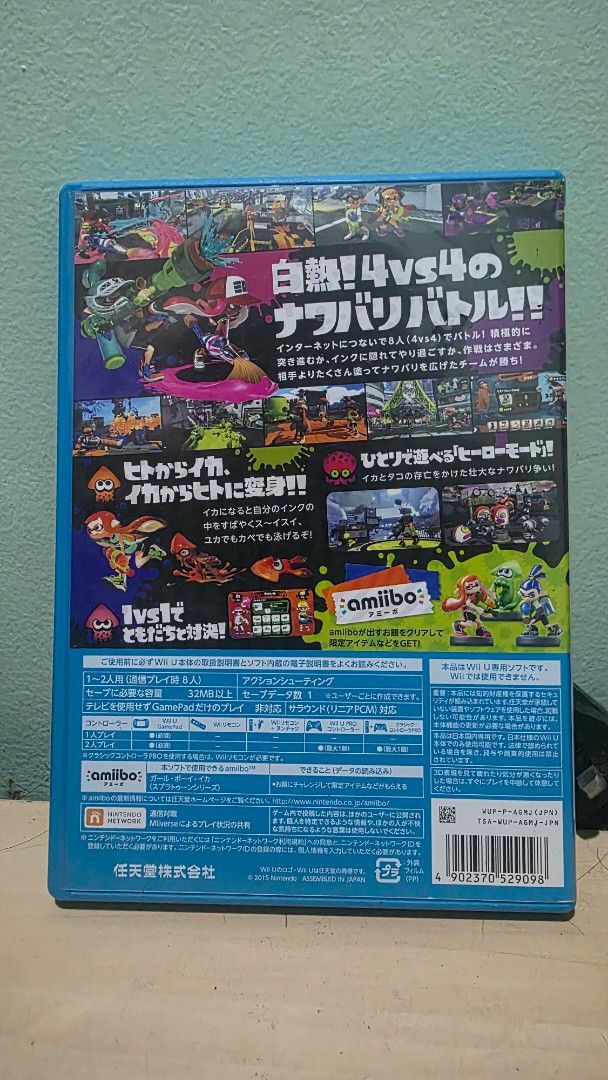Splatoon Nintendo Wii U Japanese Version Game Disc (Category: Nintendo) located in Paranaque City. Submitted by re_i_gn (Listing ID 1467194428, Image 2). Description: - Game: Splatoon (Japanese Version) - Platform: Nintendo Wii U (Region-locked for Japan consoles) - Condition: Tested and working properly - Inclusions: Original blue case, cover art, back insert, disc with green/purple squid artwork, and instruction paper.
