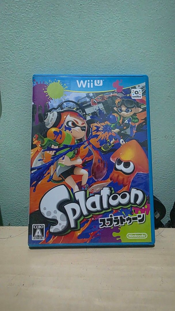 Splatoon Nintendo Wii U Japanese Version Game Disc (Category: Nintendo) located in Paranaque City. Submitted by re_i_gn (Listing ID 1467194428, Image 1). Description: - Game: Splatoon (Japanese Version) - Platform: Nintendo Wii U (Region-locked for Japan consoles) - Condition: Tested and working properly - Inclusions: Original blue case, cover art, back insert, disc with green/purple squid artwork, and instruction paper.
