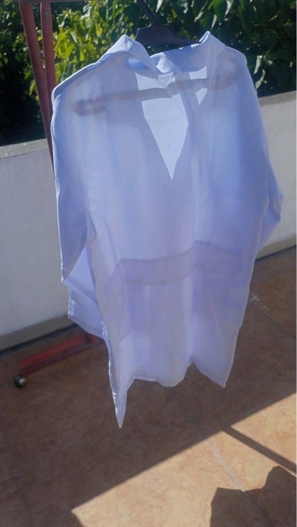 St. Mark's Lab Gown Size M (Category: Coats, Jackets and Outerwear) located in Tuguegarao City. Submitted by declutteredbyangel (Listing ID 1467295294, Image 2). Description: - Brand: St. Mark's - Size: M (true to size) - Color: White - Closure: Button-down front with 3 white buttons - Pockets: Two spacious front patch pockets .
