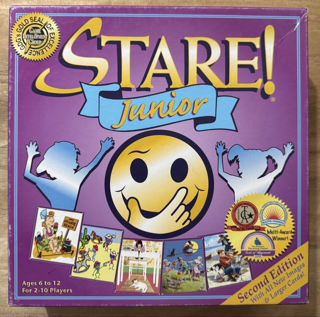 Stare Junior Second Edition Board Game (Category: Board Games & Puzzles) located in San Pedro. Submitted by pageturner19 (Listing ID 1467210724, Image 1). Description: - Game: Stare Junior Second Edition by Game Development Group - For ages: 6 to 12 years old - Players: 2 to 10 players - Includes: Game board, question-and-image cards, timer, dice, and playing pieces - Condition: Box shows normal shelf wear, but all components are clean and organi