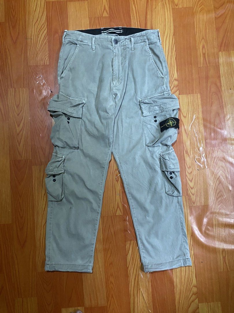 Stone island cargo pants (Category: Joggers) located in Cebu City. Submitted by jerianix (Listing ID 1467336852, Image 1). Description: Stone island cargo pants Size 30 Actual 32” base tapemeasure Length 37” Good condition Issue: pinhole & scratchs (see on last picture) .