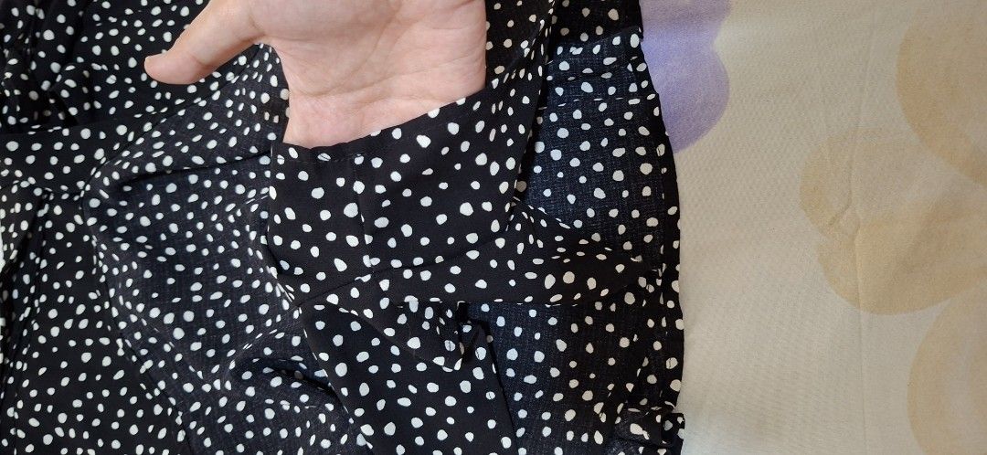 Stradivarius Black White Polka Dot Wrap Skirt (Category: Skirts) located in Taguig. Submitted by an.garcia (Listing ID 1467188649, Image 1). Description: - Brand: Stradivarius - Style: Wrap skirt with waist ties - Color/Pattern: Black with white polka dots - Size: S (EUR S, USA S, MEX 26) - Material: Lightweight fabric, made in China - Condition: Excellent - Versatile piece, easy to dress up or down for any occasion.