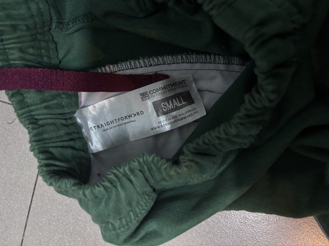 Straightforward Green Shorts Size Small (Category: Shorts) located in Bacoor. Submitted by arvzzy (Listing ID 1467362422, Image 3). Description: - Brand: Straightforward - Color: Green - Size: Small - Condition: Good - Waistband: Elastic with drawstring - Pockets: Two side pockets and a back pocket detail - Perfect for comfortable daily casual wear.