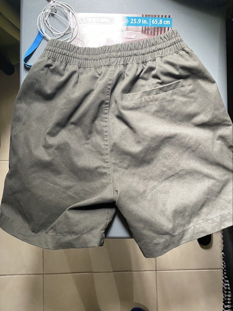 Straightforward Tailored Shorts Soft Twill Green (Category: Shorts) located in Makati City. Submitted by oddbear_e25815 (Listing ID 1467237988, Image 2). Description: - Color: Green - Material: Soft twill fabric - Waistband: Elastic with bright blue drawstring - Pockets: Two front pockets and one right-back pocket - Fit: Structured yet comfortable - Condition: Clean overall Size: S Rfs: Decluttering.