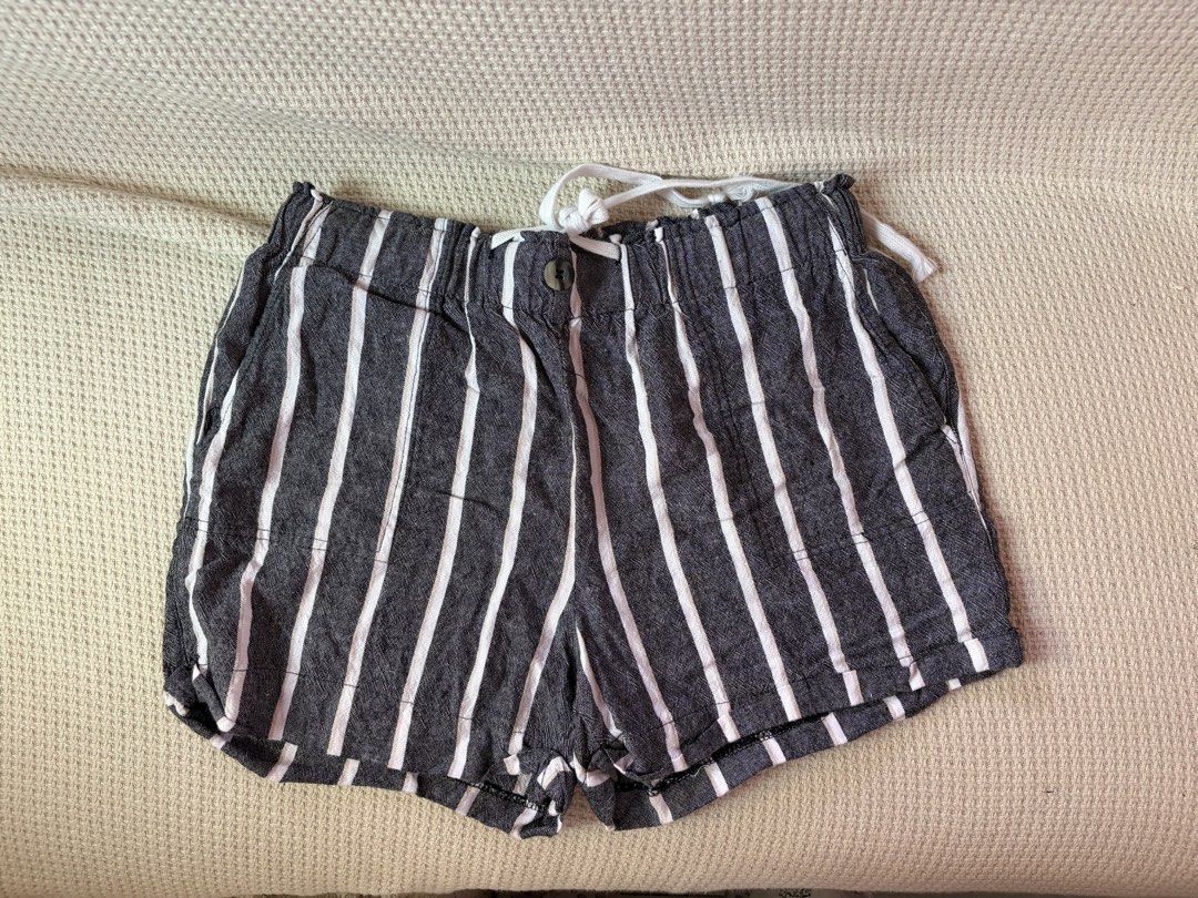Striped Shorts (Category: Shorts) located in Manila. Submitted by amilannnn (Listing ID 1467197800, Image 1). Description: - Brand: Streetwear Society - Design: Black and white vertical stripes - Condition: Like new - Features: Elastic waistband with white drawstring, center button detail, and convenient side pockets - Fabric: Lightweight, ideal for casual days out -Can fit small to medium - Summer shorts - Worn once or twice.