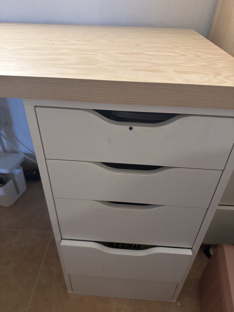 Study table (Category: Tables & Sets) located in Singapore. Submitted by khall (Listing ID 1467280090, Image 2). Description: - Spacious workstation - Includes a white 5-drawer - Ready for self-pickup (arrange own delivery) Table top: Width - 61cm Length - 120cm Height - 74cm 5 drawers Drawer dimensions: Length - 30cm Width - 52cm.