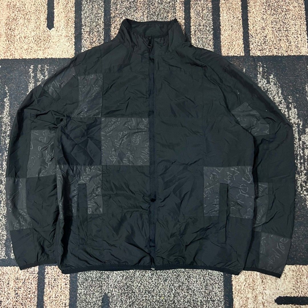 Stussy gear Black Patchwork Windbreaker Jacket (Category: Coats, Jackets and Outerwear) located in Cebu City. Submitted by royalwolf-2a85 (Listing ID 1467305784, Image 1). Description: Black Stussy jacket with a tonal patchwork pattern throughout. Full zip front, stand collar, and side zip pockets. Mesh lining inside. Stussy woven tag near the bottom hem. Lightweight shell made of 100% polyester. Great streetwear layering piece for cooler days. w