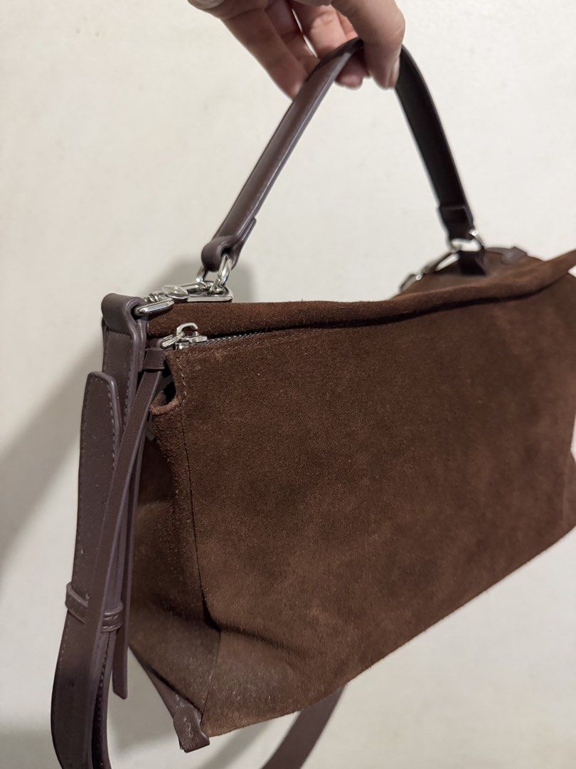 Suede Puzzle Bag (Category: Cross-body Bags) located in Las Pinas. Submitted by vinccid (Listing ID 1467206430, Image 2). Description: ✨ cross body - hand bag (puzzle design) ✨ suede and leather material ✨ bag only (no inclusions).