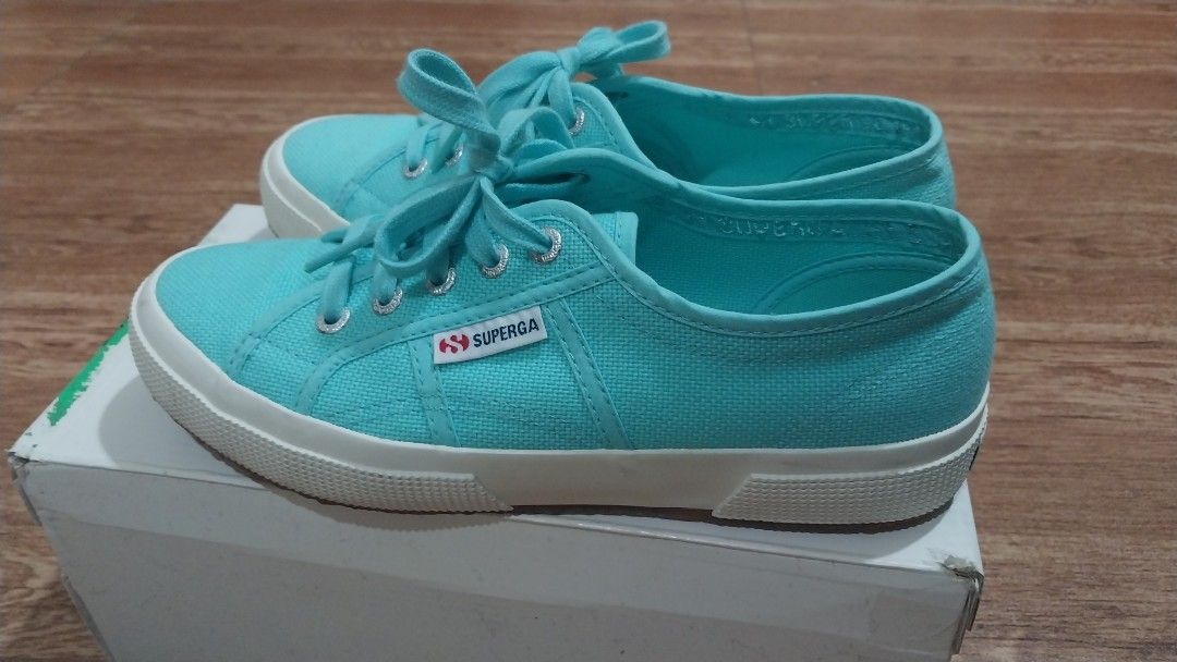 Superga Classic Turquoise (Category: Sneakers) located in Manila. Submitted by muzmith (Listing ID 1467327290, Image 1). Description: Superga Azure Turquoise 2750-Cotu Classic Size US 7.5 W/ EUR 38 / 25cm (US and EUR sizes based on box, cm size based in person) Super cute turquoise/cyan shoes (pictures appear blue but it is more vibrant in person). Only used once. With orig box. RFS: Bought for the color but the shoe is a bit too big for me becau
