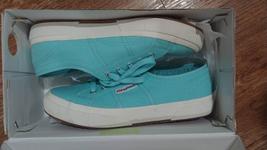 Superga Classic Turquoise (Category: Sneakers) located in Manila. Submitted by muzmith (Listing ID 1467327290, Image 2). Description: Superga Azure Turquoise 2750-Cotu Classic Size US 7.5 W/ EUR 38 / 25cm (US and EUR sizes based on box, cm size based in person) Super cute turquoise/cyan shoes (pictures appear blue but it is more vibrant in person). Only used once. With orig box. RFS: Bought for the color but the shoe is a bit too big for me becau