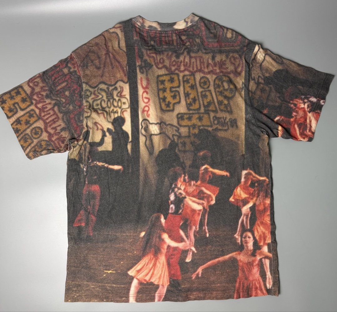 Supreme Ballet Ss25 Top Size L (Category: Tshirts & Polo Shirts ) located in Manila. Submitted by limsanity03 (Listing ID 1467251624, Image 2). Description: - Brand: Supreme - Size: Large - Design: All-over graphic print with ballet dancers and graffiti artwork on front and back - Condition: Clean neckline, no major fading or flaws - Actual Dimes width 24 length 30.