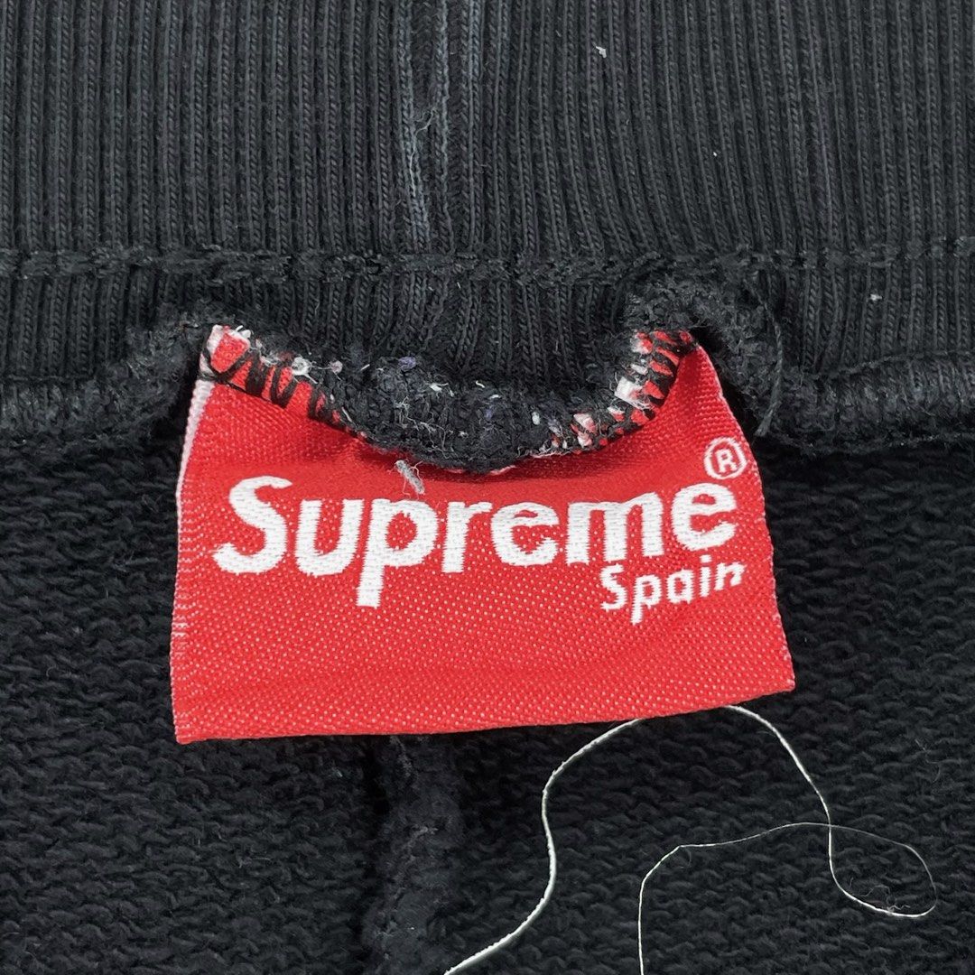 Supreme Spain Side Tape Black Jogger Pants (Category: Joggers) located in Manila. Submitted by buzz.garments (Listing ID 1467353797, Image 3). Description: Size: Medium on tag Dimensions(inches) -Waist/Width: 32”-42” (Strechable) -Hip: 19” -Front Rise: 11” -Thigh: 11” -Inseam: 28” -Outseam/Length : 38” -Leg Opening: 4” - color may vary due to lighting. please manage your expectations-minimal and unseen flaws must be considered..