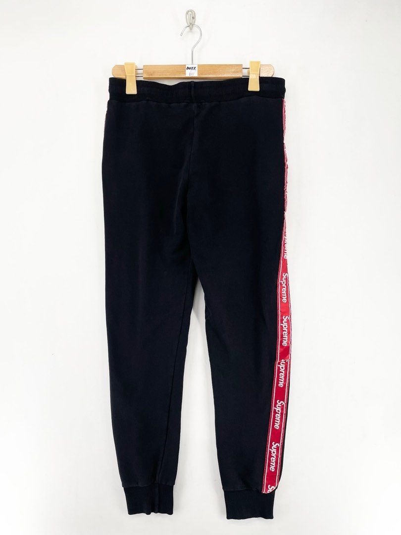 Supreme Spain Side Tape Black Jogger Pants (Category: Joggers) located in Manila. Submitted by buzz.garments (Listing ID 1467353797, Image 2). Description: Size: Medium on tag Dimensions(inches) -Waist/Width: 32”-42” (Strechable) -Hip: 19” -Front Rise: 11” -Thigh: 11” -Inseam: 28” -Outseam/Length : 38” -Leg Opening: 4” - color may vary due to lighting. please manage your expectations-minimal and unseen flaws must be considered..