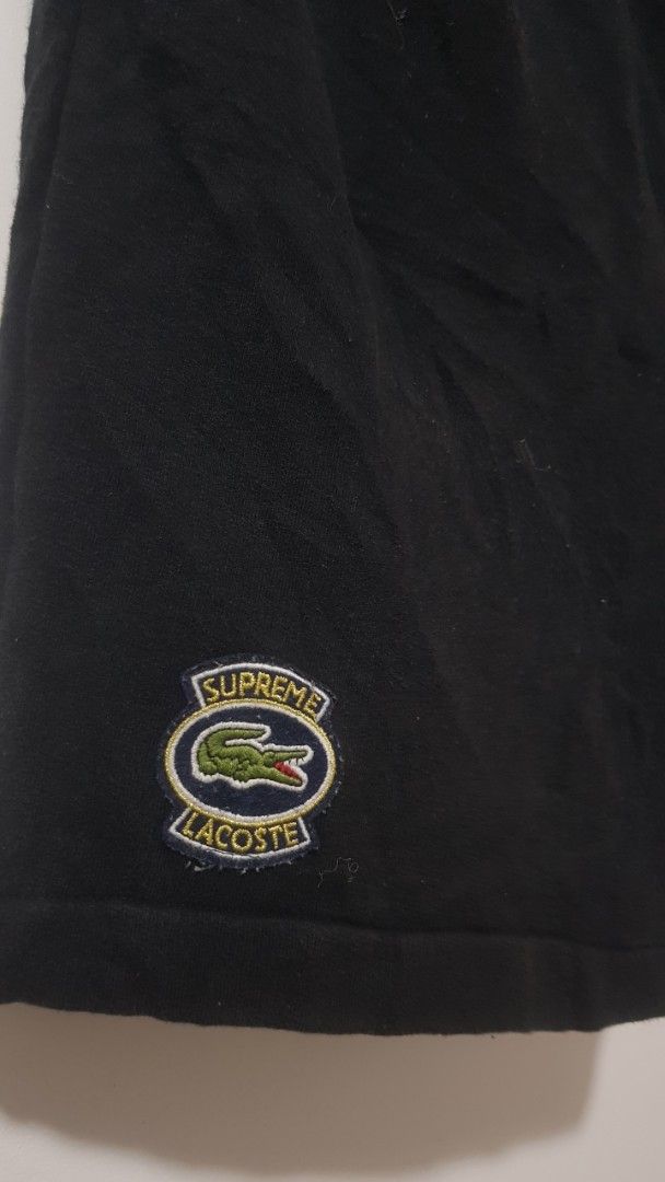 Supreme x Lacoste Live Shorts Black (Category: Shorts) located in Manila. Submitted by nice430 (Listing ID 1467296476, Image 2). Description: - Brand: Supreme x Lacoste - Color: Black - Material: Heavy cotton fleece for ultimate daily comfort - Fit: Elastic waistband with adjustable drawstring - Details: Embroidered dual-brand oval patch logo on the left leg - Condition: Clean, ready for street style fits.