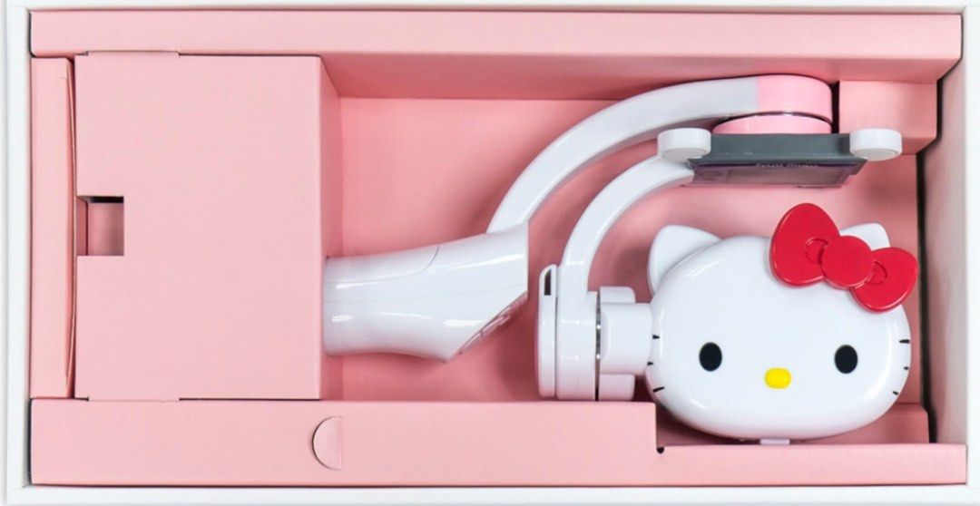 SwiftCam Hello Kitty Smartphone Gimbal (Category: Cameras) located in Manila. Submitted by janetecson05 (Listing ID 1467177191, Image 1). Description: - Official Kitty x SwiftCam smartphone gimbal - Cute white stabilizer featuring Kitty's face and red bow - Ensures smooth and steady video recording - Comes complete with original pink branded packaging box and user manual - Fun and practical accessory for fans, vloggers, and content creators - Con