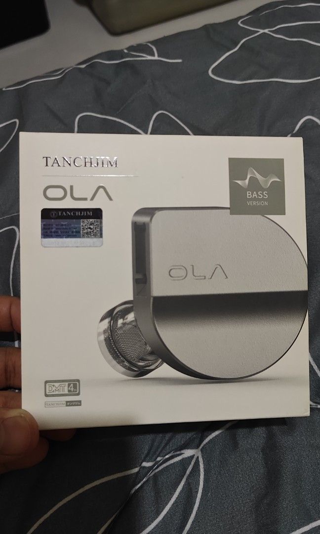 Tanchjim OLA Bass (Category: Headphones & Headsets) located in Manila. Submitted by kimochi1590 (Listing ID 1467283407, Image 1). Description: Tanchjim OLA Bass Bought it around a year ago. Still in very excellent condition with zero damage and very well taken cared of. Used but never abused. Repacked as if it was brand new. All earbuds are still complete, wire is in pristine silver condition. Only issue is the pouch is a little dirty, nothing a 