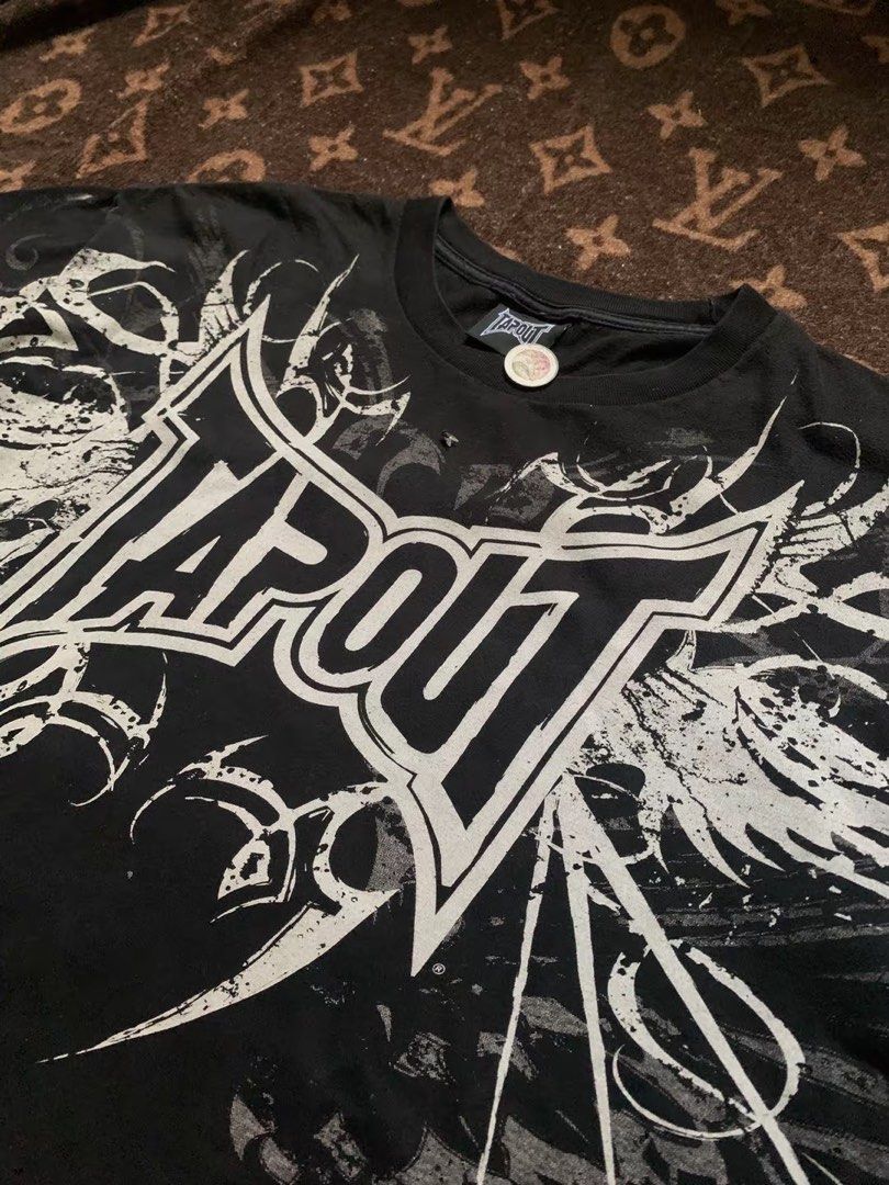 TAPOUT TRIBAL (Category: Formal Shirts) located in Manila. Submitted by bobzshoppp (Listing ID 1467211670, Image 3). Description: TAPOUT TRIBAL Large on tag W-22 L-27.5-28 condition 10/10 No issue: FORSALE DM Note:⚠️⚠️ ⚠️ - Expect some minor flaws as the item was thrifted -Color may vary due to lightning - Shipping fee must be shouldered by the buyer .