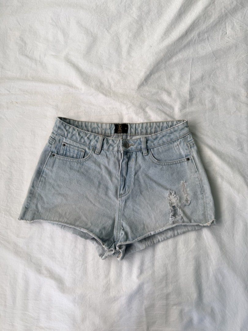 Tattered shorts (Category: Shorts) located in Tarlac. Submitted by el401_ (Listing ID 1467171893, Image 1). Description: Size 28 on tag/size 30 on measuring tape Length 11.5.