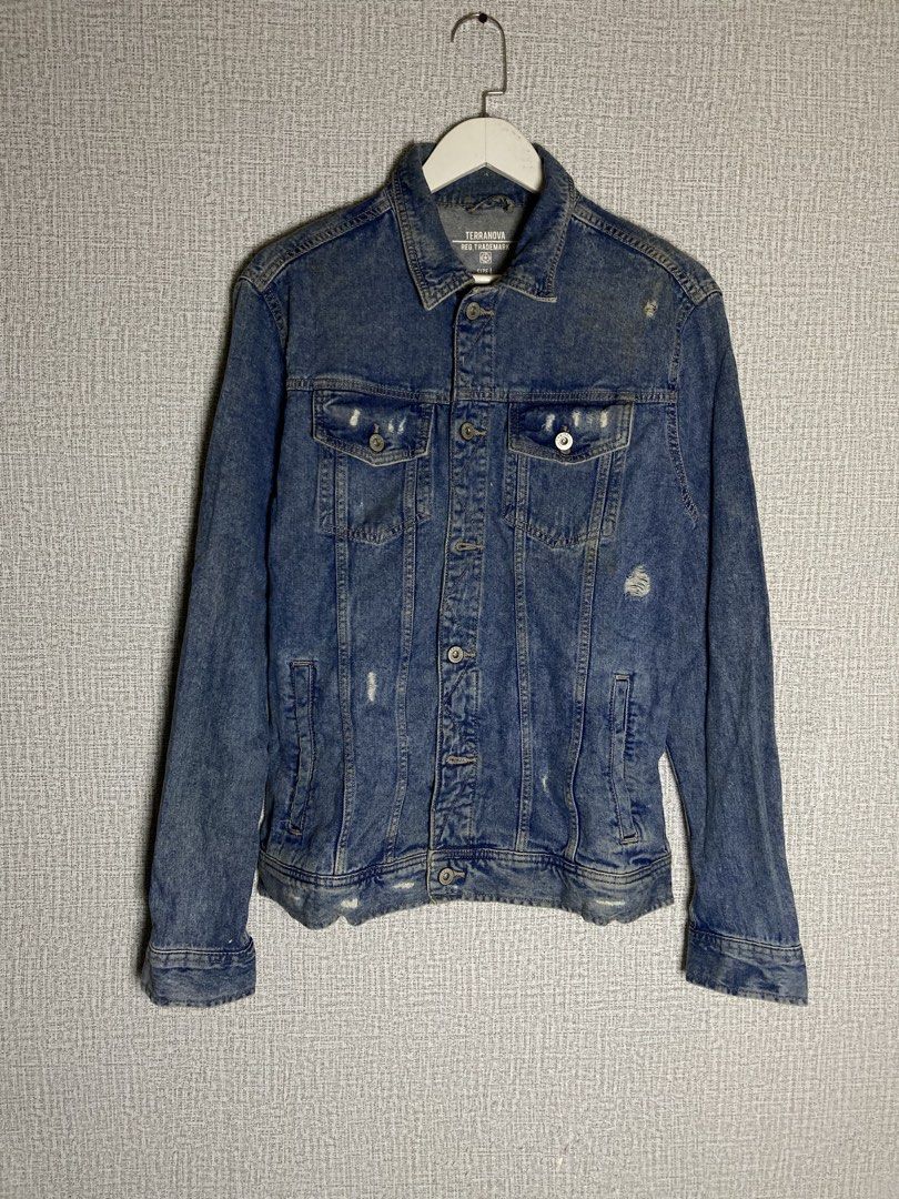 Terranova Blue Denim Jacket Distressed Size L (Category: Coats, Jackets and Outerwear) located in Baguio. Submitted by drip_n_drop (Listing ID 1467324714, Image 1). Description: - Brand: Terranova (Teddy S.P.A.) - Size: L - Wash: Medium blue with stylish distressed details on the chest and front - Pockets: Dual chest flap pockets and convenient side slip pockets - Closure: Classic button-up with a standard collar neckline - Condition: Great casua