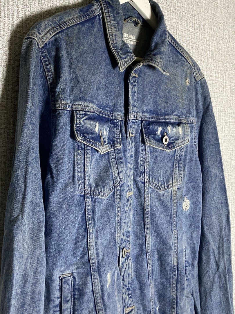 Terranova Blue Denim Jacket Distressed Size L (Category: Coats, Jackets and Outerwear) located in Baguio. Submitted by drip_n_drop (Listing ID 1467324714, Image 3). Description: - Brand: Terranova (Teddy S.P.A.) - Size: L - Wash: Medium blue with stylish distressed details on the chest and front - Pockets: Dual chest flap pockets and convenient side slip pockets - Closure: Classic button-up with a standard collar neckline - Condition: Great casua