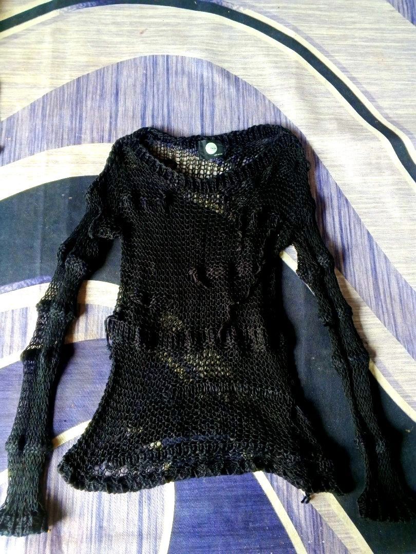 THE DOT NET SWEATSHIRT (Category: Dresses) located in Manila. Submitted by icamalicdem29 (Listing ID 1467203046, Image 3). Description: grunge-style black open-weave distressed knit top, popular within alternative, gothic, punk, and Y2K streetwear aesthetics. It features loose, laddered web detailing and deliberately tattered drop-stitches along the sleeves and bodice..