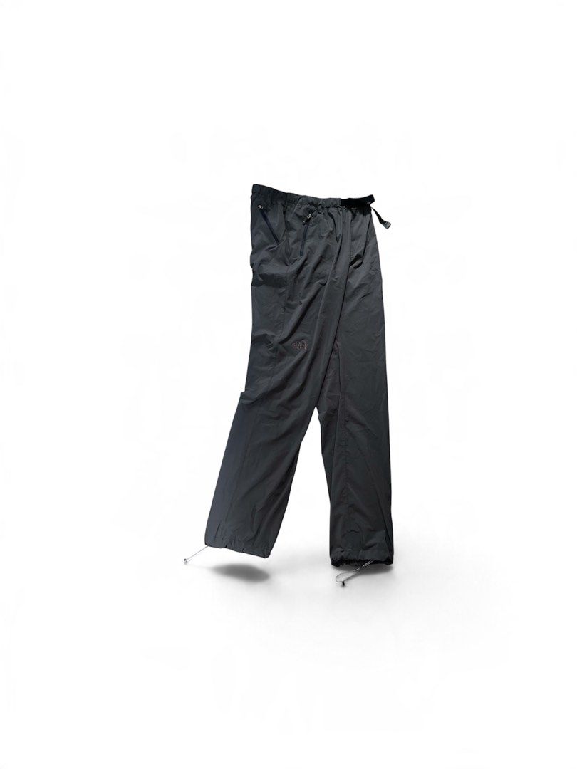 The North Face Hiking Pants (Category: Trousers) located in Nabua. Submitted by lastthrift2.0 (Listing ID 1467220297, Image 1). Description: •XL on tag •Dimes=32-34x41 Material: Lightweight, flexible nylon - Waist: Built-in adjustable belt with sturdy buckle - Pockets: Secure zippered pockets on both sides - Cuffs: Adjustable drawstring at the bottom for custom ankle fit - Details: Subtle embroidered logo on the right thigh.