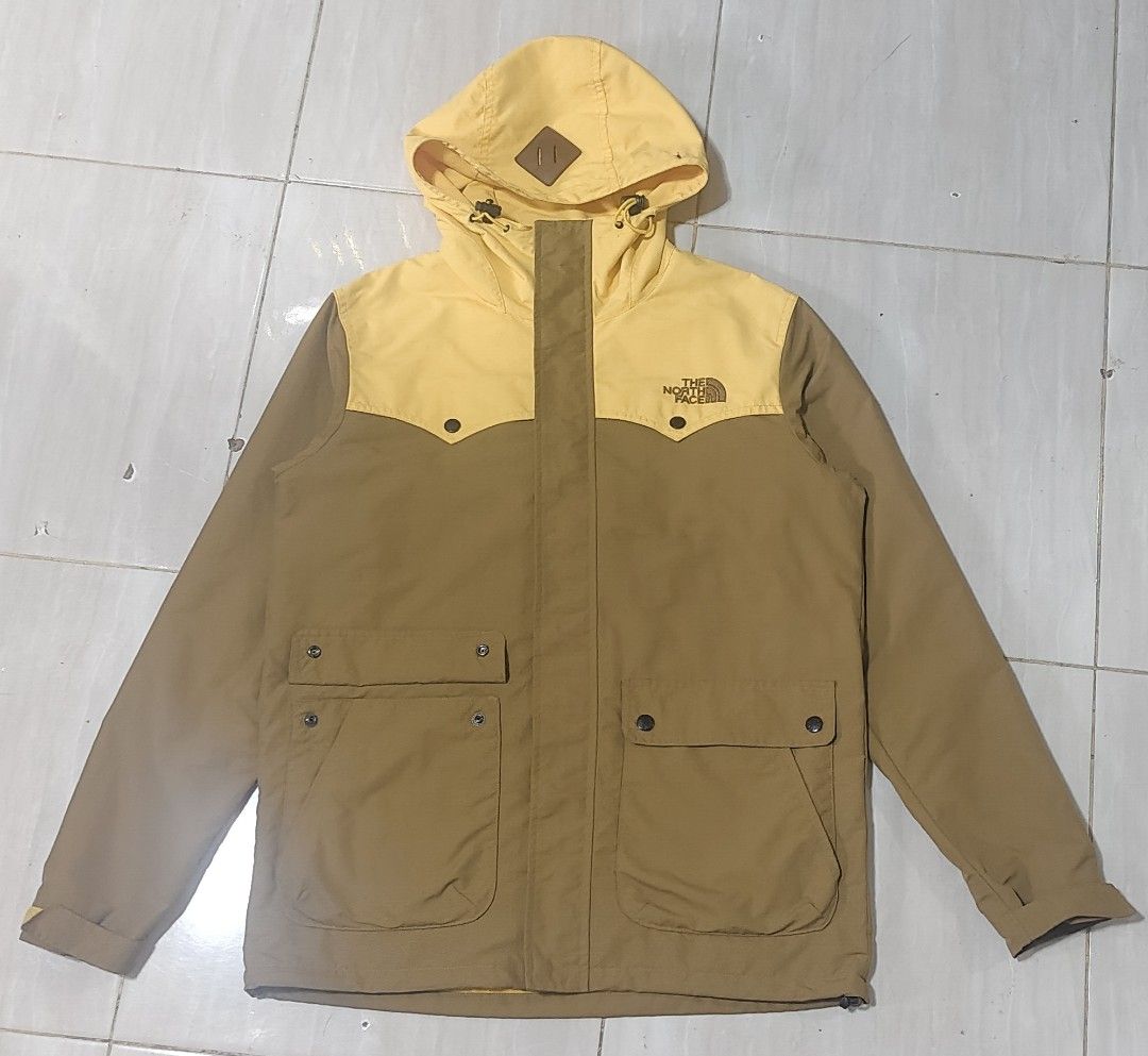 The North Face Yellow Brown Winter Jacket Size M (Category: Coats, Jackets and Outerwear) located in Manila. Submitted by ranaothriftselector (Listing ID 1467309622, Image 2). Description: 💯% authentic THE NORTH FACE 900+SF SIZE: 95 on tag Small/medium fit No issue Brandnew condition Napaka solid pa nito mga boss Location: Mindanao LDS.