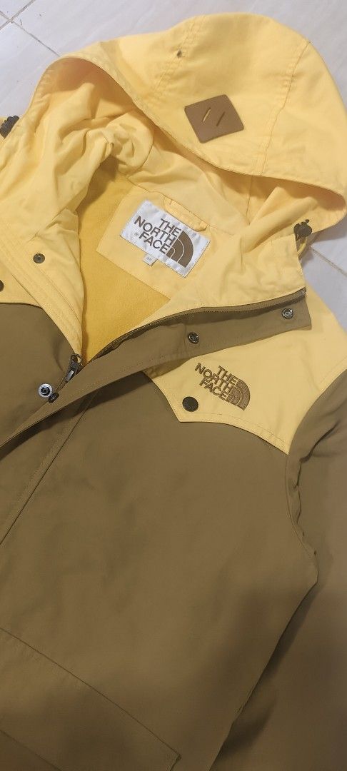 The North Face Yellow Brown Winter Jacket Size M (Category: Coats, Jackets and Outerwear) located in Manila. Submitted by ranaothriftselector (Listing ID 1467309622, Image 1). Description: 💯% authentic THE NORTH FACE 900+SF SIZE: 95 on tag Small/medium fit No issue Brandnew condition Napaka solid pa nito mga boss Location: Mindanao LDS.