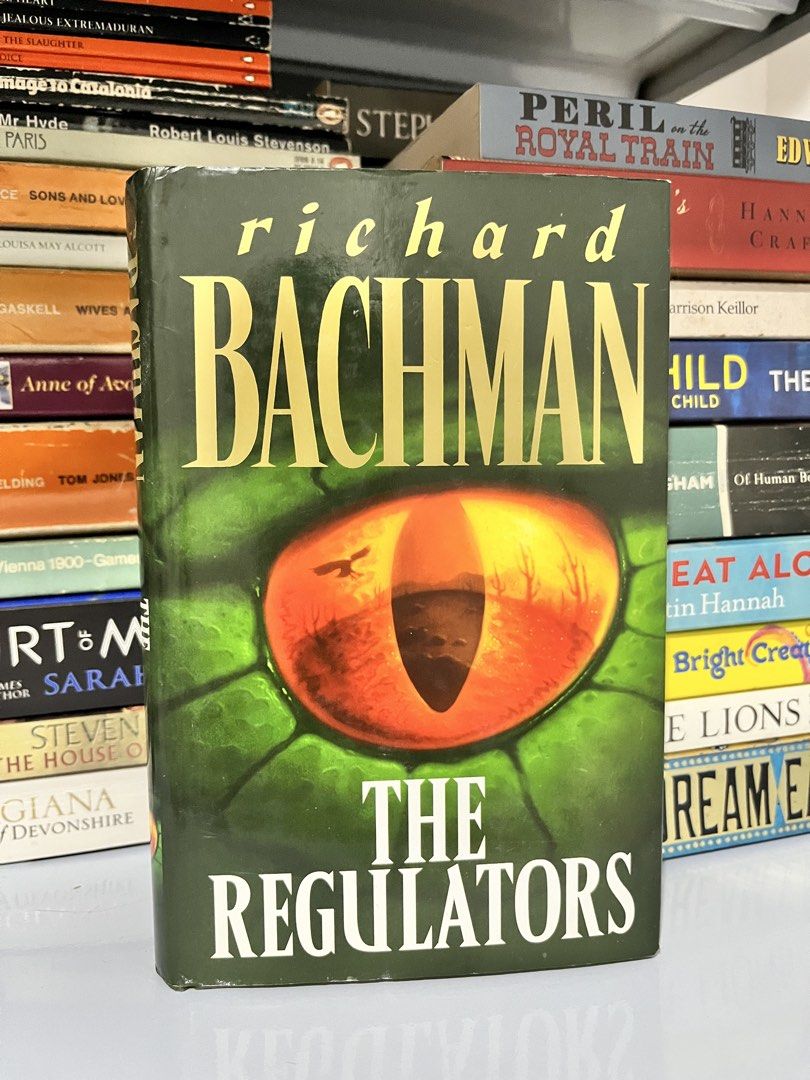 The Regulators by Richard Bachman BCA Hardcover (Category: Textbooks) located in Maragondon. Submitted by quilljoylibrary (Listing ID 1467308463, Image 1). Description: - Title: The Regulators by Richard Bachman (published by BCA) - Format: Hardcover with original dust jacket - Aesthetics: Green cloth boards with elegant gold lettering on the spine - Condition: Sturdy binding with a clean interior (no major creases or tears) - Flaws: Slight yello