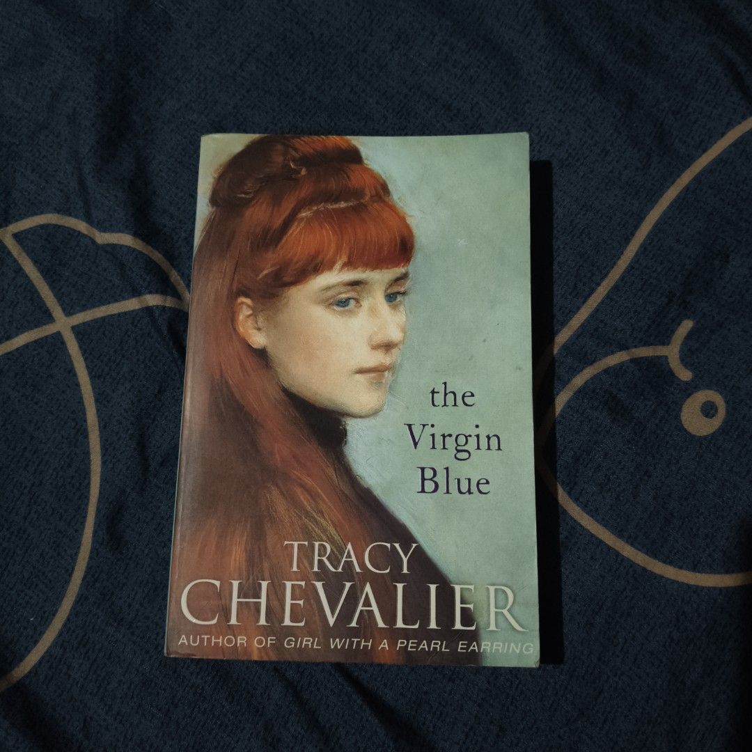 The Virgin Blue by Tracy Chevalier paperback (Category: Storybooks) located in Villasis. Submitted by rajjinni (Listing ID 1467297399, Image 1). Description: - Title: The Virgin Blue by Tracy Chevalier (Author of Girl with a Pearl Earring) - Format: Paperback - Condition: Pages show natural yellowing from age/storage; minor wear on cover corners; spine is fully intact.