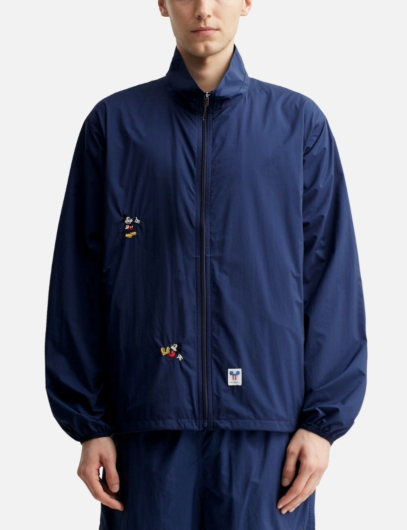 THISISNEVERTHAT x Mickey PERTEX® EQ Packable Windbreaker (S/Navy) (Category: Coats, Jackets and Outerwear) located in Malabon City. Submitted by eligadz (Listing ID 1467216595, Image 1). Description: BNWOT Condition 10/10 Size S, fits up to M W 23 x L 26 in. Color: navy Light, stylish and comfy Embroidered Mickey design Water repellent and packable Ripstop fabric 2 zip side pockets No issues or flaws 1990+sf Thanks.