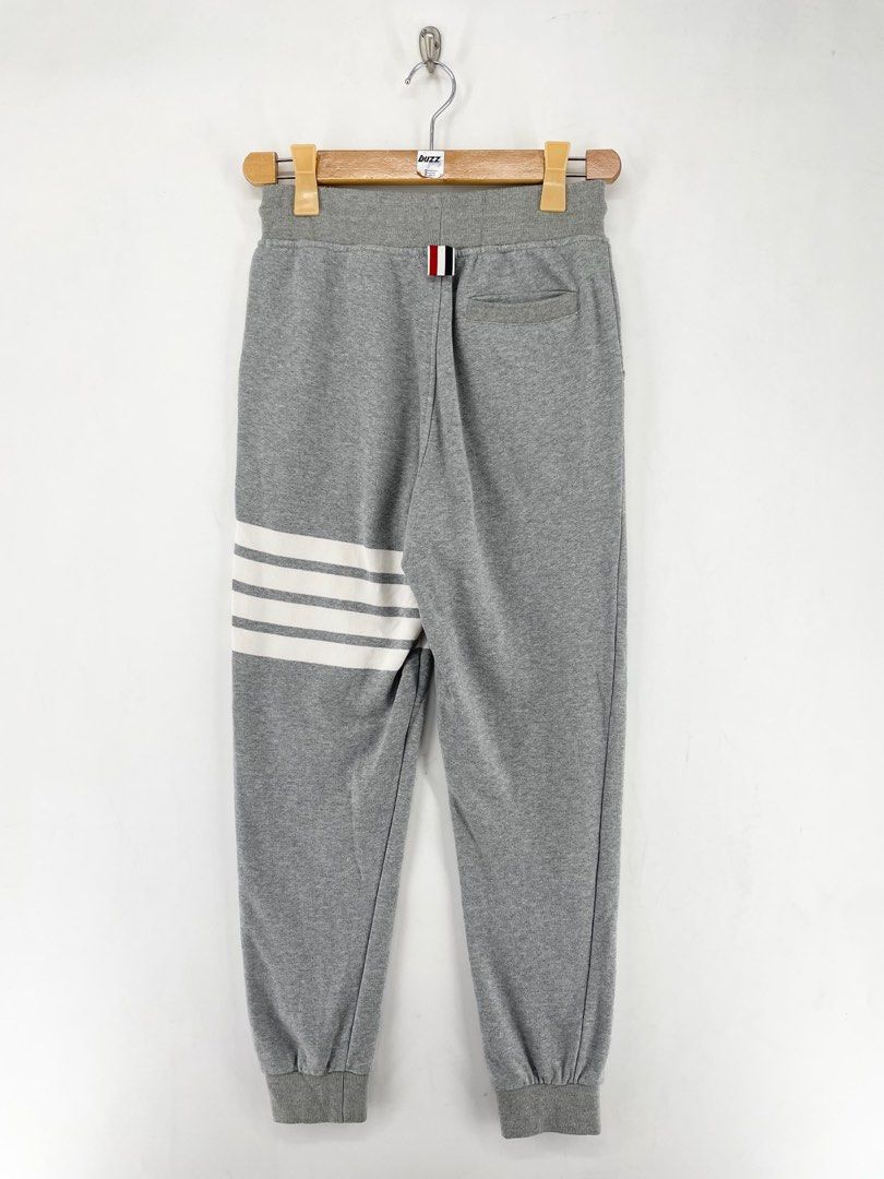 Thom Browne 4-Bar Gray Classic Jogger Pants (Category: Joggers) located in Manila. Submitted by buzz.garments (Listing ID 1467354282, Image 2). Description: Size: 1 on tag Dimensions(inches) -Waist/Width: 26”-36” (Strechable) -Hip: 18” -Front Rise: 13” -Thigh: 10” -Inseam: 25” -Outseam/Length : 35” -Leg Opening: 4” - color may vary due to lighting. please manage your expectations-minimal and unseen flaws must be considered..