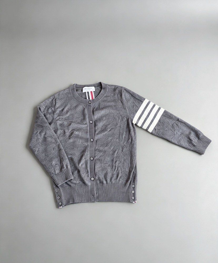 Thom browne knitted cardigan (Category: Luxury Apparel) located in Manila. Submitted by 2ndmemoir (Listing ID 1467195806, Image 3). Description: Thom browne issue cut washtag one missing botton Excellent condition 9.8 colorate Good as new No flaws Need wash .