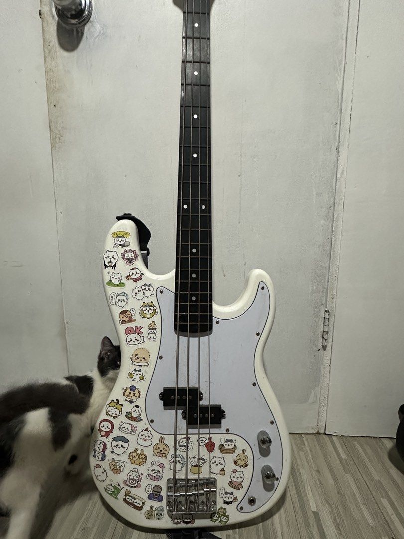 Thomson 4 String P-Bass (Category: Musical Instruments) located in Malabon City. Submitted by pluto23.5 (Listing ID 1467305548, Image 2). Description: Thomson 4 String P Bass Guitar Needs cleaning and tuning, haven’t used in a long time since my amplifier broke. Stickers can be removed, not permanent! Included: Guitar bag Ampli cord Di kasama yung pusa.