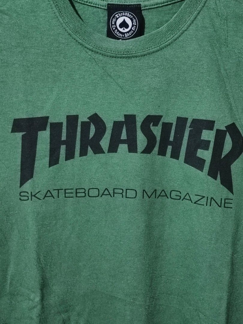 THRASHER SKATEBOARD MAGAZINE LOGO TEE (Category: Tshirts & Polo Shirts ) located in Iloilo. Submitted by gooddimes (Listing ID 1467354745, Image 2). Description: Thrasher Skateboard Magazine Logo Tee Authentic Army Green Color Size on tag: Medium Dimes: 19.5Wx29L Issue/s: None Color rate: 9.5/10 Like new condition ₱700 Reminders: - All items are thrifted, please manage your expectations - Color may vary due to lighting - Please wash before using 