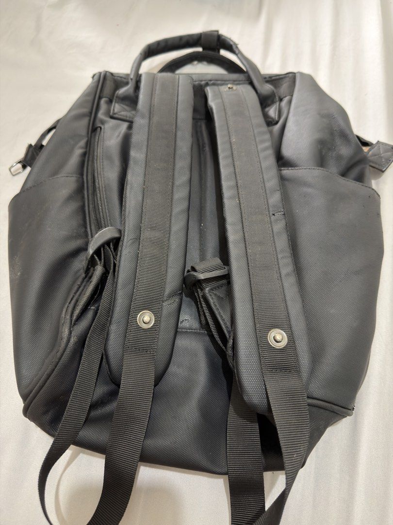 Tigernu Black Casual Backpack (Category: Backpacks) located in Makati City. Submitted by thisisshy (Listing ID 1467233528, Image 2). Description: - Authentic Tigernu backpack in sleek black, made from durable and sturdy material - Ideal everyday bag for school, work, or daily commute - Features top carrying handles and comfortable adjustable shoulder straps - Secure front flap pocket with buckle closure plus an extra zipped compartment - Wide-ope