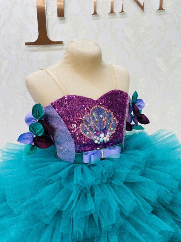 Tiny Pieces Ariel 2 in 1 Gown s7 (Category: Babies & Kids Fashion) located in Pasig City. Submitted by cacishop (Listing ID 1467233881, Image 3). Description: There’s a skintone strap so dress doesnt fall This was custom made Includes separate tutu skirt Bag included Negotiable but almost half of the price not accepted.