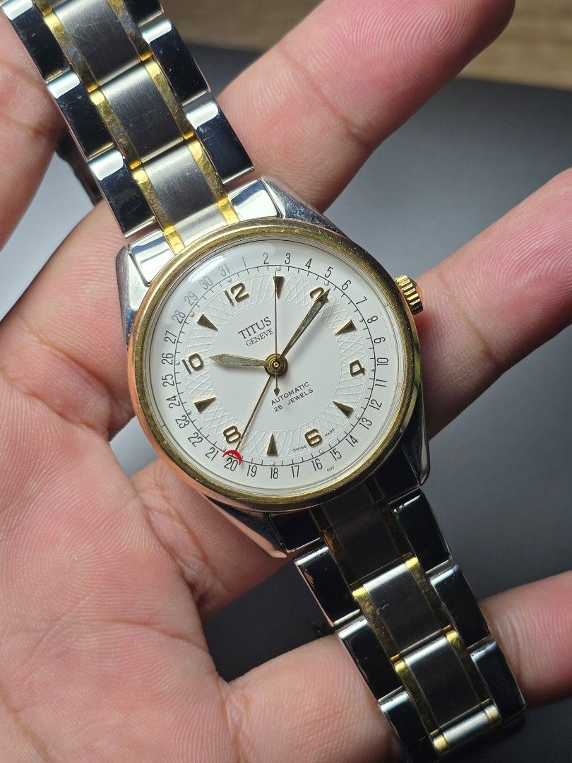 Titus pointer date (Category: Men's Watches) located in Manila. Submitted by strapsnskins (Listing ID 1467354581, Image 1). Description: • Brand: Titus Genève (Solvil et Titus) • Complication: Pointer Date — instead of a traditional date window, a central crescent-tipped hand points to the dates (1 to 31) printed along the outermost track of the dial. • Movement: Automatic self-winding mechanism containing 25 Jewels (frequently utilizing a reliab